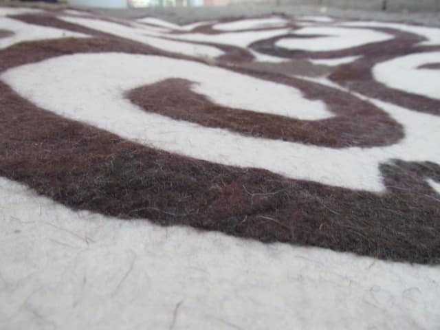 wet-felted-rug-sheep-horn-no dye-handmade decorating-hand felting projects-felting wool